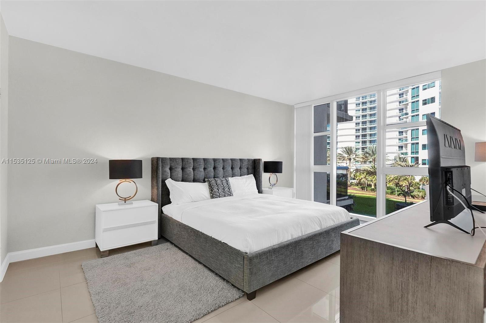 10275 COLLINS AVE #406, BAL HARBOUR, FL 33154