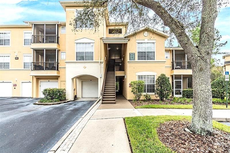 91F | OXFORD PLACE AT TAMPA PALMS A CONDOMINIUM