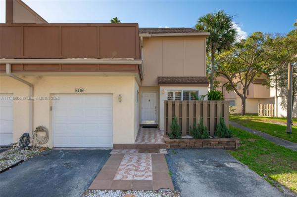 TOWNHOUSES AT JACARANDA C