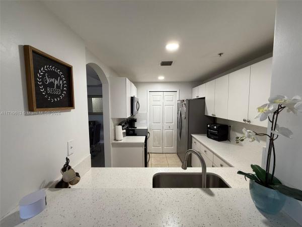 THE COURTS AT DORAL ISLES