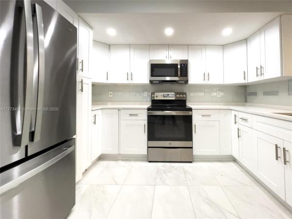 GRAND MARQUIS CONDO HOMES