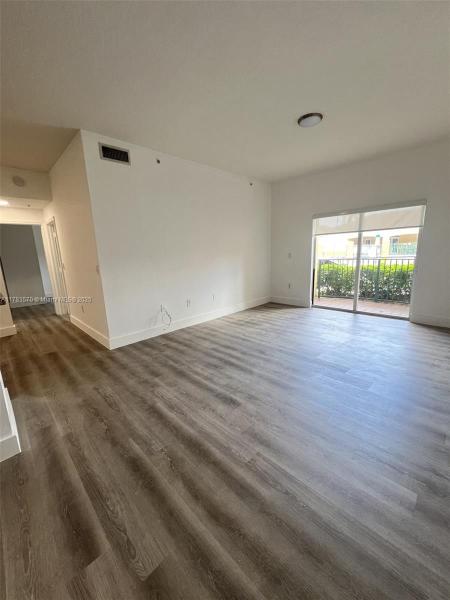 PALM GARDENS AT DORAL CON