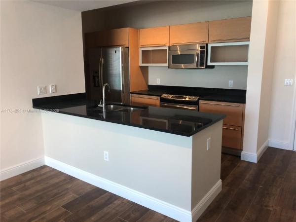 THE PLAZA 901 BRICKELL CO