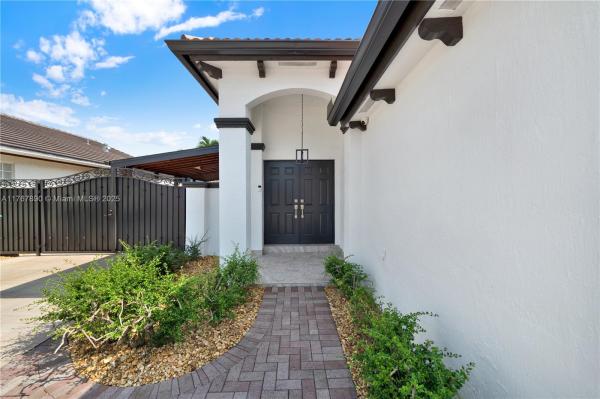 SHOMA HOMES AT TAMIAMI IV