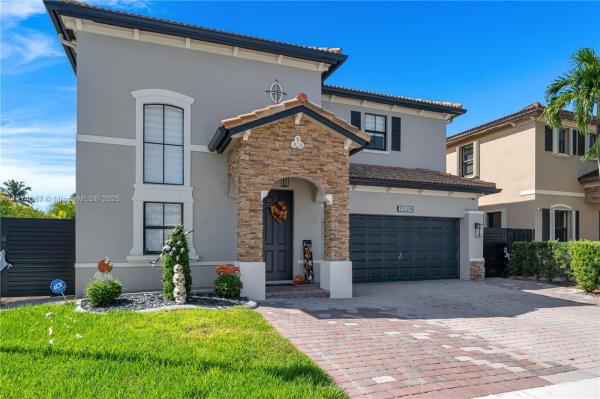 CENTURY GARDENS AT TAMIAM