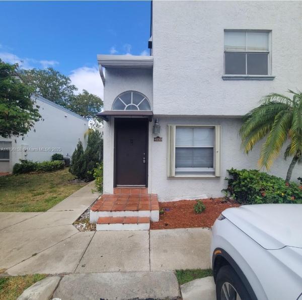 THE GREENS AT DORAL CONDO