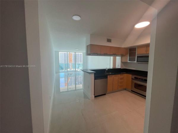 BRICKELL ON THE RIVER N T