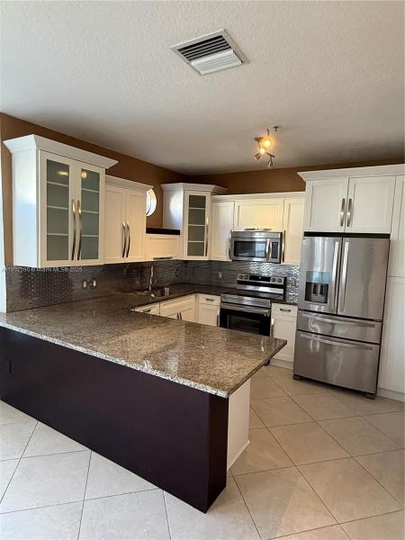 COURTYARDS FOUR CONDO