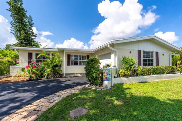 SUNRISE GOLF VILLAGE SEC