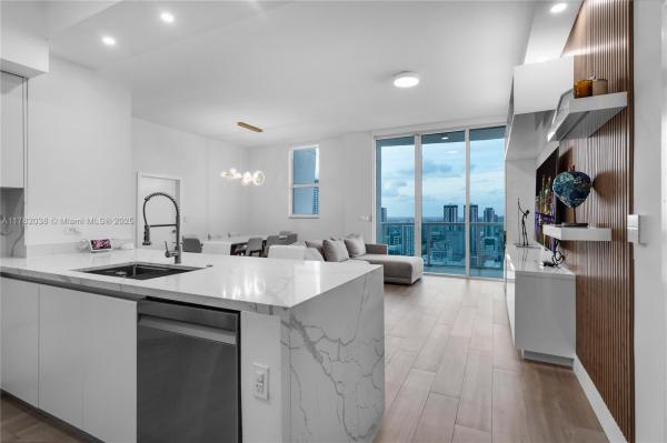 BRICKELL ON THE RIVER N T