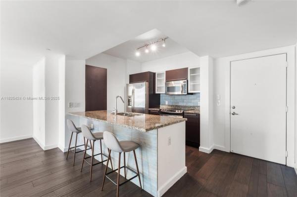 THE PLAZA 901 BRICKELL CO