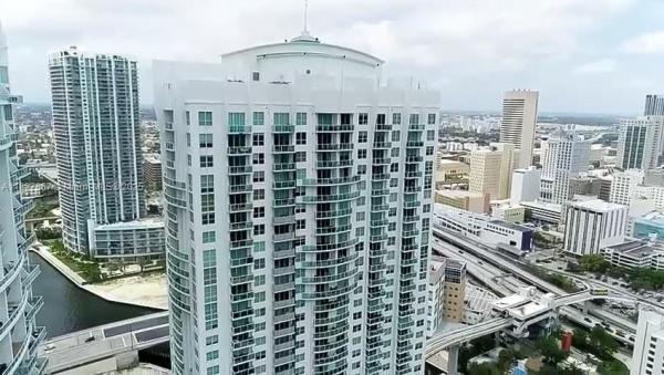 BRICKELL ON THE RIVER N T