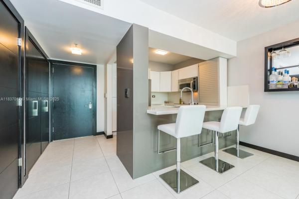 BRICKELL ON THE RIVER N T