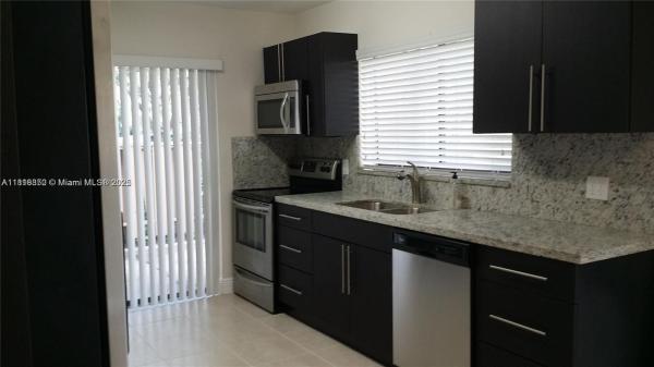 WIMBLEDON AT JACARANDA CO