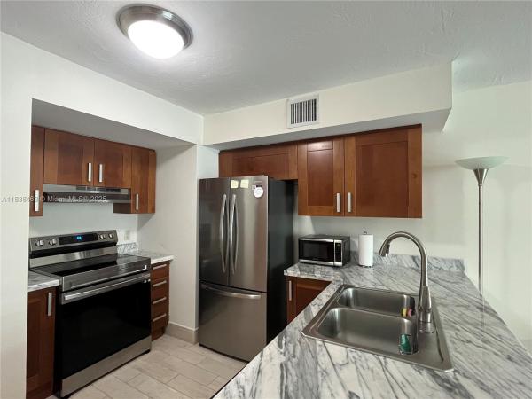 9499 COLLINS AVE #307, SURFSIDE, FL 33154