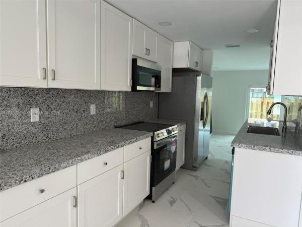 TOWNHOUSES AT JACARANDA C