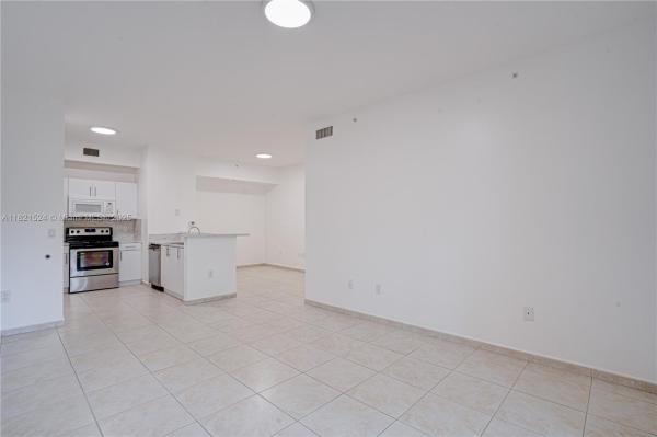 PALM GARDENS AT DORAL CON