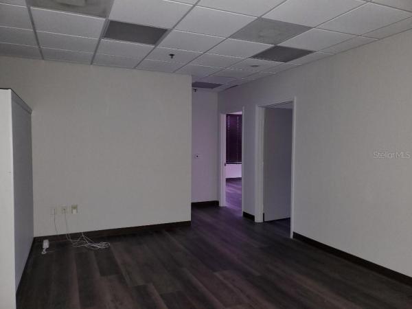 MAGNOLIA CORPORATE CENTER A CONDO FIRST AMD