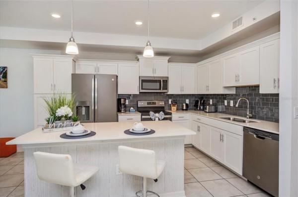 THE TERRACES AT STOREY LAKE CONDO 1 PH 4