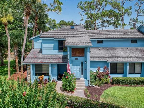 SANDPIPER LAKE AT PELICAN BAY CONDO PH 02-05