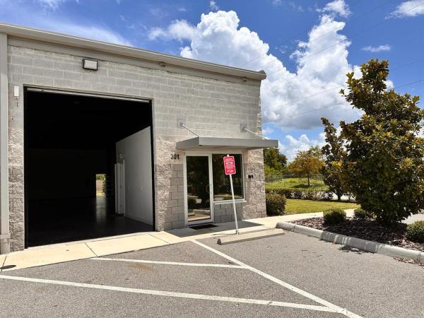 TBC BUS CENTER COMM CONDO PH 2