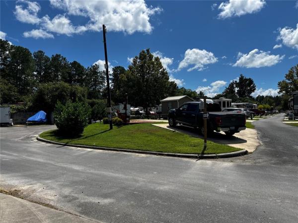 VILLAGE PARK AT THE WILDERNESS RV PARK ESTATES