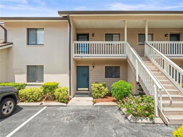 CARROLLWOOD PLACE A CONDOMINIU