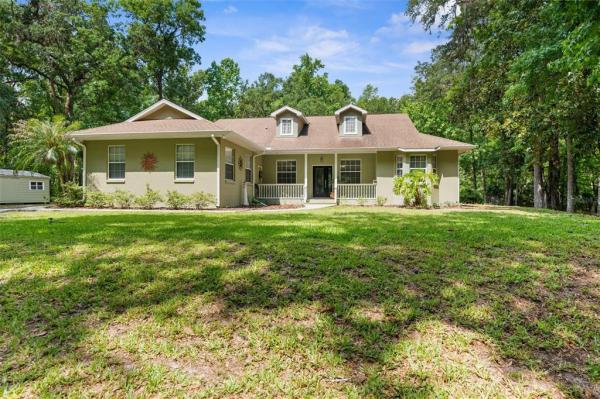 THAT PART OF E1/2 OF NW 1/4 OF SW 1/4 LYING S OF R