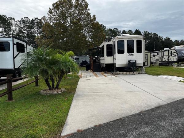 VILLAGE PARK AT THE WILDERNESS RV PARK ESTATES