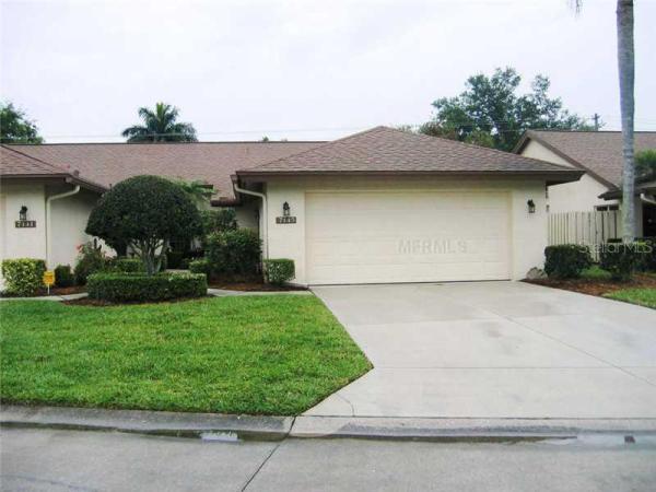 WOODLAKE VIILAS AT PALM AIRE PH IX
