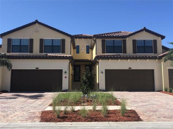 GRAN PARADISO, COACH HOMES III AT