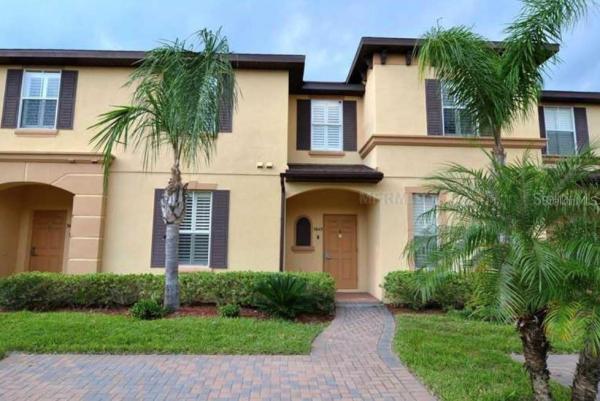 VILLA AT REGAL PALMS CONDO