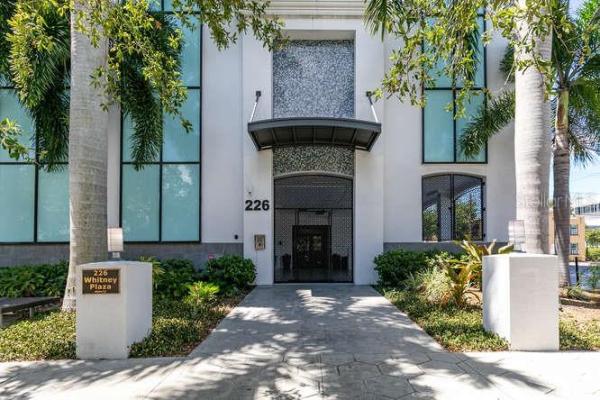 WALKER-WHITNEY PLAZA CONDO