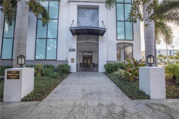 WALKER-WHITNEY PLAZA CONDO