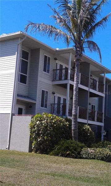 VILLAGE AT HOLMES BEACH LAND CONDO