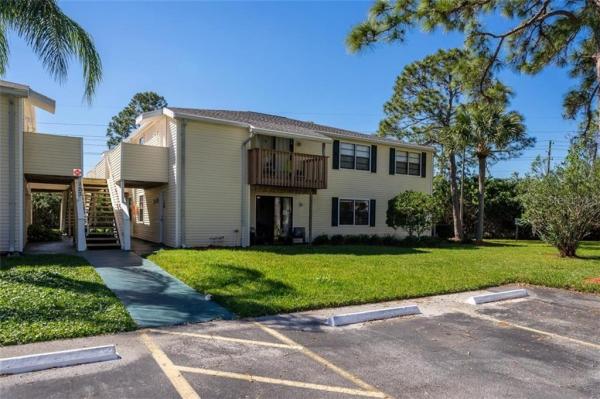 GARDENS OF FOREST LAKES CONDO THE