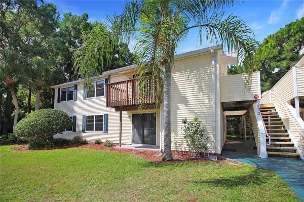 GARDENS OF FOREST LAKES CONDO THE