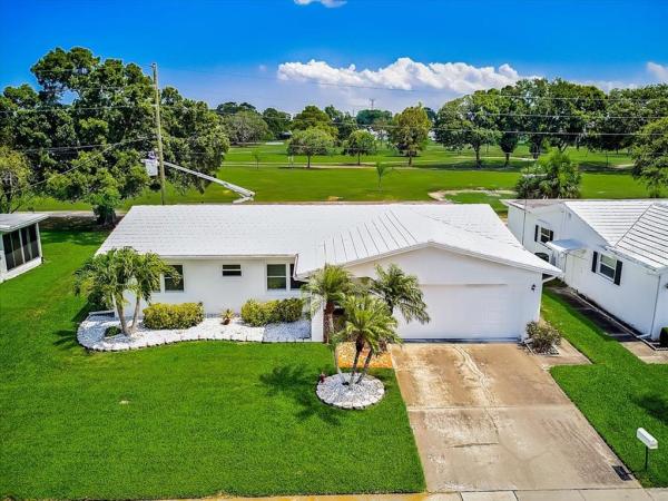 MAINLANDS OF TAMARAC BY THE GULF UNIT 5 PH 1 CONDO