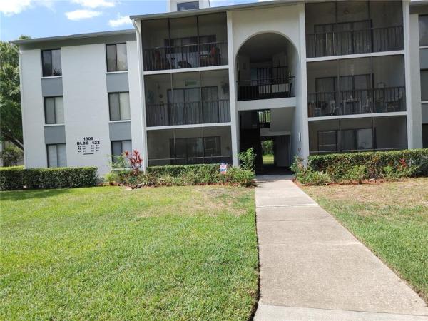 PINE RIDGE AT LAKE TARPON VILLAGE