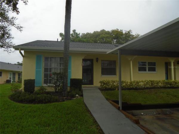 WOODLAND VILLAS CONDO 1