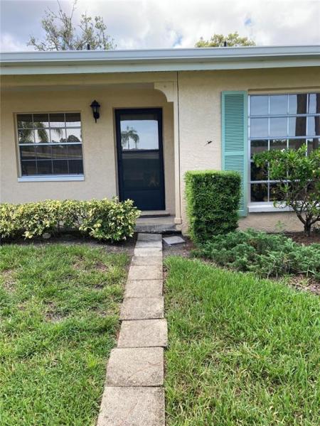 WOODLAND VILLAS CONDO 1