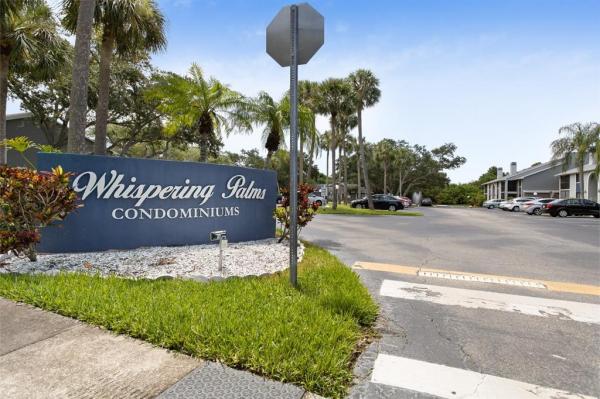 WHISPERING PALMS CONDO