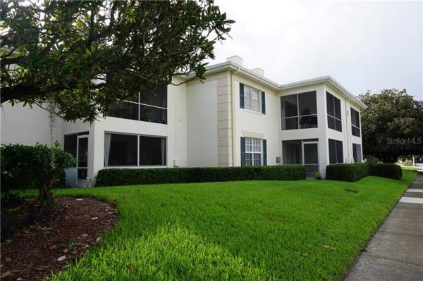 GRAND AT OLDE CARROLLWOOD CONDO