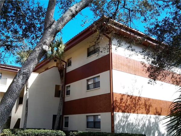 RUSTLEWOOD AT COUNTRYSIDE CONDO