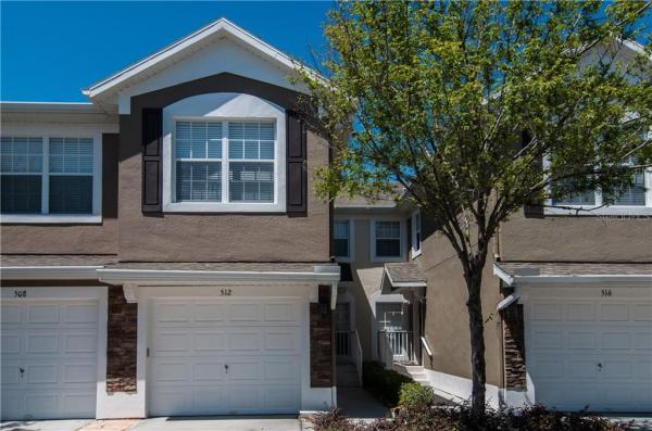 CARRIAGE HOMES AT DUNWOODY COMMONS A CONDO