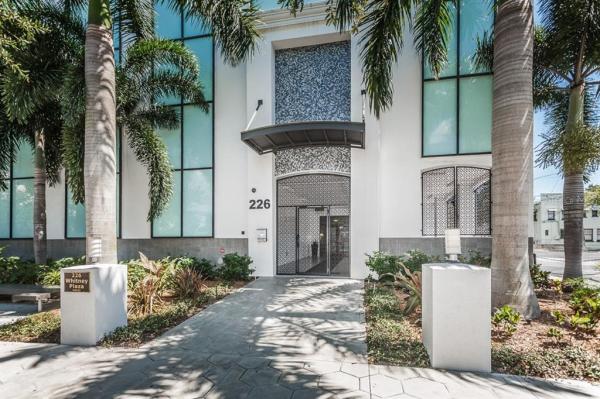 WALKER-WHITNEY PLAZA CONDO