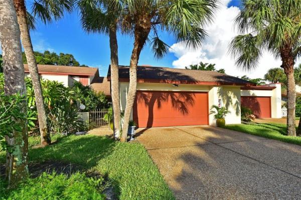 RACQUET CLUB VILLAS CONDO AMD