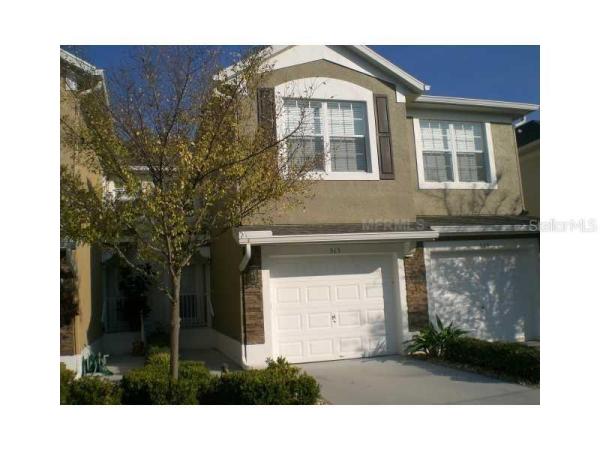 CARRIAGE HOMES AT DUNWOODY COMMONS A CONDO