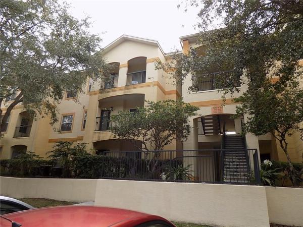 PINNACLE AT CARROLLWOOD A CONDO