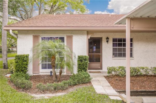 WOODLAND VILLAS CONDO 1